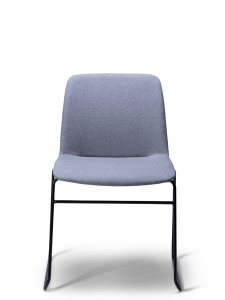 Breo blue grey upholstered chair with a black sled base, front view