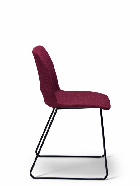 Breo wine upholstered chair with a black sled base