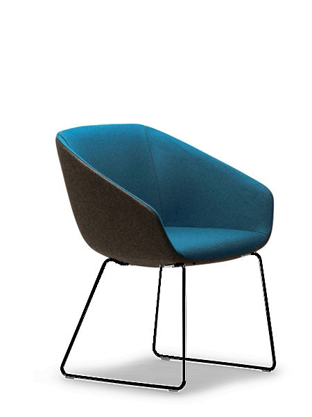 Delphi two tone upholstered armchair with black sled base.