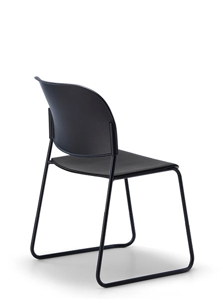 LUMIA PP multipurpose chair in black with plastic seat and sled base frame, back view