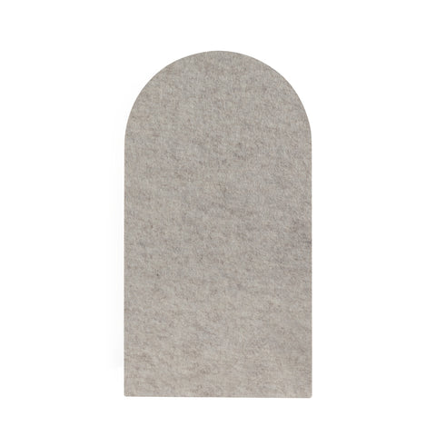 An arched pinboard in mushroom color