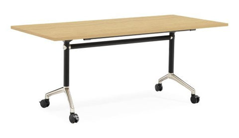 Typhoon Flip Top Table with oak tabletop, black frame, and polished aluminium feet with locking castors.