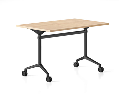 Typhoon Flip Top Table with oak tabletop, black frame, and polished aluminium feet with locking castors.