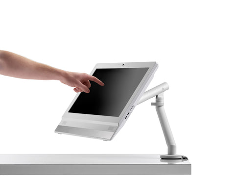 Flo single monitor arm mounted on a desk with a monitor