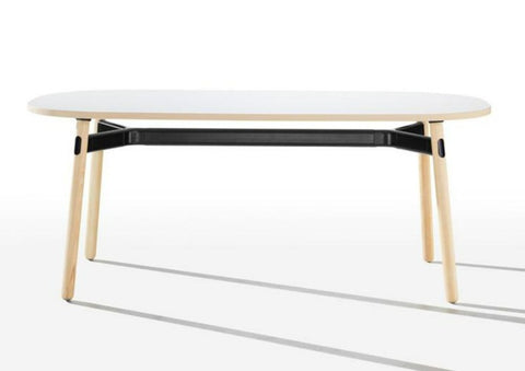 Okidoki rounded rectangular table with white top, black frame, and ash timber legs