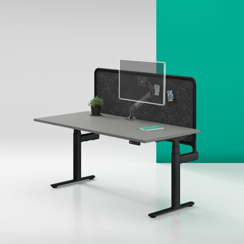 Vader Single Monitor Arm with empty VESA plate for monitor attachment, mounted on desk.