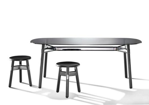 Okidoki rounded rectangular table with tempered black glass top and black timber legs and matching stool
