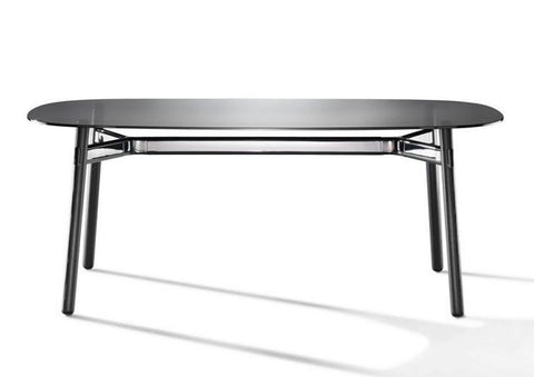 Okidoki rounded rectangular table with tempered black glass top and black timber legs