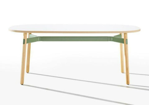 Okidoki rounded rectangular table with white top, green frame, and ash timber legs