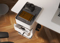 White Anti Gravity Caddy mounted on a desk, with lockable drawer and bag hook visible
