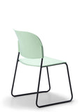 LUMIA PP multipurpose chair in green with plastic seat and sled base frame, back view