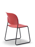 LUMIA PP multipurpose chair in red with plastic seat and sled base frame, back view