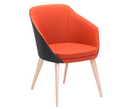 Annette Timber Natural chair with orange and black upholstered tub seat, mid-back design, and tapered timber legs