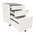 White mobile steel pedestal with three open drawers, lock mechanism on the front and lockable castors