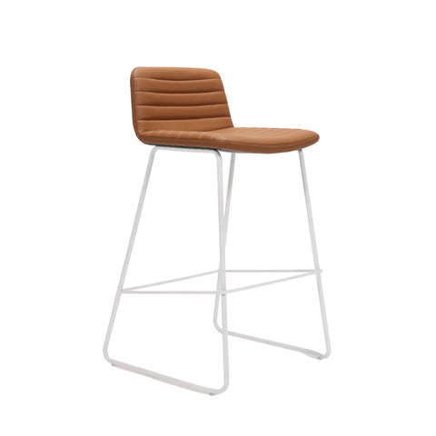 Pixel Bar Stool in amber PU leather with ribbed stitching detail and white sled base with foot rail, modern and durable seating