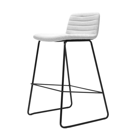 Pixel Counter Stool in light grey fabric upholstery with ribbed stitching detail and black sled base with foot rail, modern and durable seating