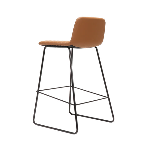 Pixel Counter Stool in amber PU leather with ribbed stitching detail and black sled base with foot rail, modern and durable seating