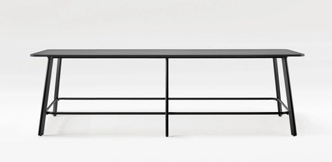 Black Rosie side table with modular design, integrated foot rail system, and contemporary style for modern office use