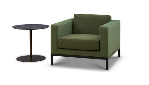 Spirit Lounge arm chair with fabric upholstery, powder coated steel frame legs, and side table