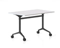 Typhoon Flip Top Table with white tabletop, black frame, and polished aluminium feet with locking castors.