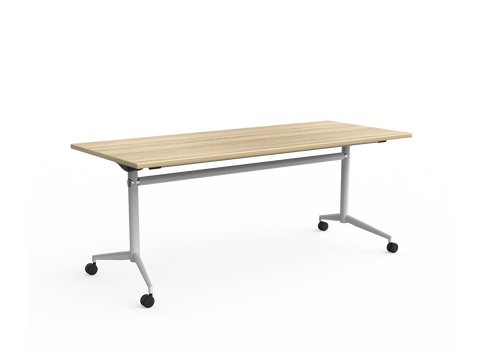 Uni Flip Table with melamine top in oak, safety flip mechanism, and lockable castors