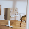 Modern frameless acoustic desk screen in recycled PET, mounted for privacy and workspace organization