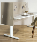 Modern frameless acoustic desk screen in recycled PET, mounted for privacy and workspace organization