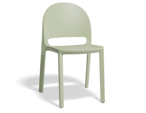 Mint green polypropylene dining chair with modern contours, lightweight and stackable for versatile indoor or outdoor use.

