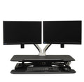 Vertilift Pro desk riser in black with dual monitor, keyboard and mouse on the lower platform