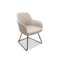 Betty tub chair with a sled base in beige color with hoop design