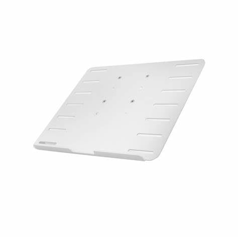 A white laptop tray with rubber grips and a lip to prevent the laptop from slipping