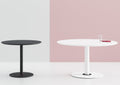 Two Disc Base Juno tables with varying diameters, one with white tabletop and one with black tabletop