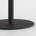 Close up of Disc Base Juno table base in black