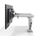 Flo dual monitor arm setup shown sideways. The device is mounted on a desk clamp and features adjustable joints for angle and length customization.