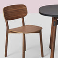 Okidoki chair with a plywood seat and backrest in walnut color and Okidoki side table