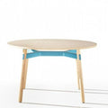 Okidoki round coffee table with top and legs in ash color and blue frame