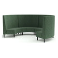 Round modular lounge in green made up of connected chair and bench units, with a high back and upholstered in fabric