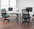 Black Buro Mentor office chair with mesh back and nylon base, in an office setup