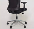 Buro mentor black upholstered office chair with a polished aluminum base back angle